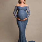 beautiful pregnant woman wearing a blue lace gown by maternity photographer norfolk