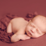 Beautiful Newborn baby girl by newborn photographer in Norfolk