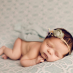 Beautiful Newborn baby girl by newborn photographer in Norfolk