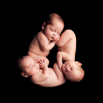 Beautiful Newborn triplet baby boys by newborn photographer in Norfolk